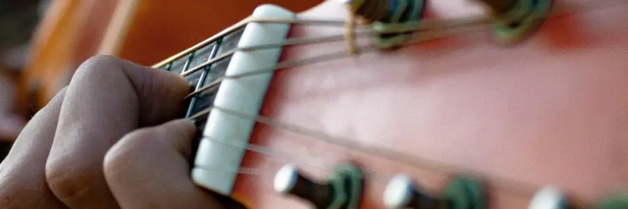 12 Causes Solutions For Buzzing Guitar Strings That Actually