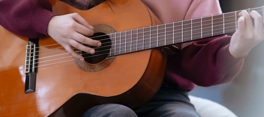 plastic strings on acoustic guitar