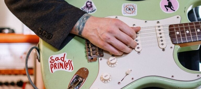 is-it-safe-to-put-stickers-on-a-guitar-should-you-rock-guitar-universe